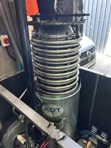New boiler coil being installed into industrial hot pressure washer during emergency repair in Atherstone.